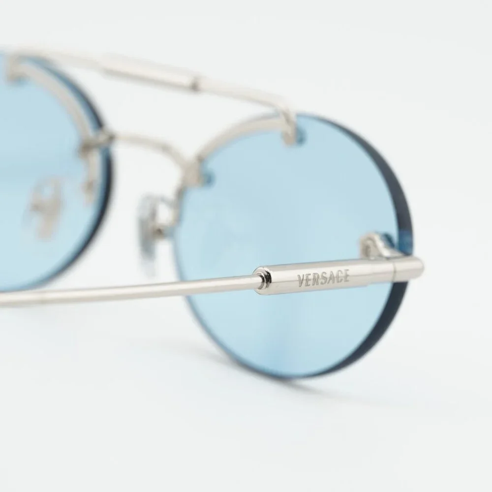 Versace VE2295 1000/1 Sunglasses Silver Oval Frame, Light Blue Lenses